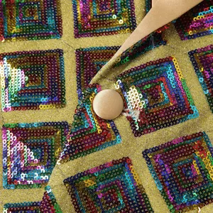 Men's sequin suit jacket detail view, colorful geometric square pattern with gold fabric.
