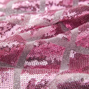 Detailed close-up of pink and silver square sequin fabric for fashion men sequin blazer jacket
