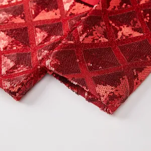 Red sequin fabric detail of men's casual fashion blazer with 3D square pattern design.