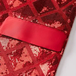 Men's red sequin blazer detail shot, featuring geometric 3D square pattern and satin pocket.