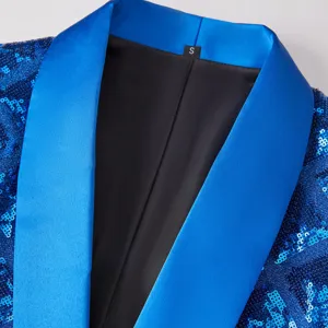 Close-up detail of mens blue sequin blazer lapel with satin collar and size tag.
