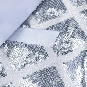 Detailed view of sparkling silver square sequins and satin fabric for men stylish party blazer.