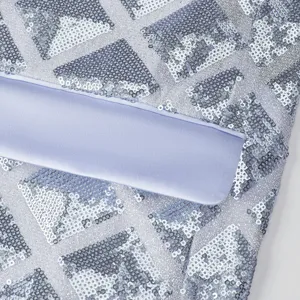 Men's fashion sequin blazer fabric detail, square sequin design with smooth satin trim.