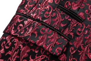 Close-up detail of men suit jacket fabric with red jacquard floral pattern and satin trim.