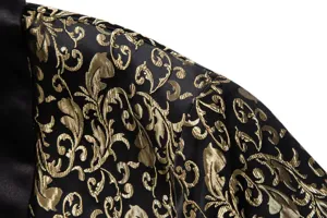 Close-up detail of men luxury black gold jacquard suit jacket shoulder with elegant scroll.