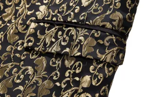 Close-up view of black gold jacquard fabric, elegant pocket and fine pattern on formal blazer.