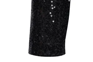 Close-up detail of black sequin fabric shimmering texture for stylish men's apparel design.