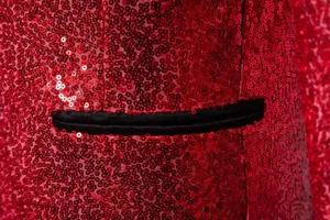 Men sequin suit jacket detail close up, red sparkle blazer pocket texture presentation.