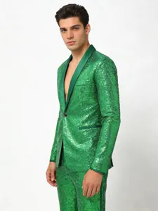 Detailed view of men's green sequin blazer featuring satin lapel and shimmering party look.