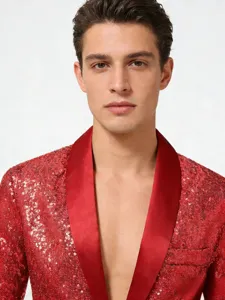 Close-up of red sequin blazer detailing for men, featuring a sleek satin shawl collar.