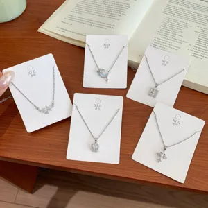 Stunning silver necklace collection featuring star, moon, and floral pendants for elegant style.