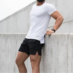 Men athletic sports shorts detail view featuring zipper pockets and adjustable drawstring waist.
