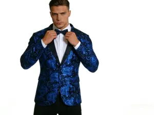 Detailed view of men's blue paisley blazer jacket with black satin lapel and stylish pattern.