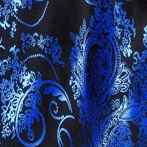 Paisley print fabric texture detail close up showing blue and black stylish blazer textile pattern.