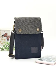 Casual denim crossbody phone bag with adjustable strap and chic anchor logo detail for daily.