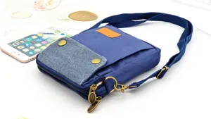 Casual canvas crossbody bag for women with multiple layers and practical zippers.