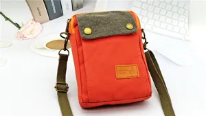 Casual canvas crossbody phone bag with multi-layer pockets and contrast color design.