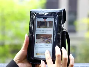 Borsa a tracolla per telefono in pelle PU nera con finestra touchscreen trasparente.