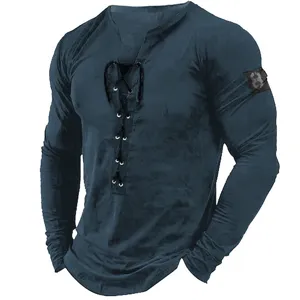 Close-up detail of dark blue men's long sleeve Henley shirt featuring a lace-up V-neck design.