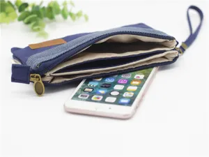 Pochette multi-couches en toile pour femme, sac cosmétique bleu avec dragonne et zip.