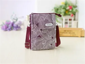 Canvas crossbody phone bag with leaf pattern, multi-layer mini shoulder bag for women.