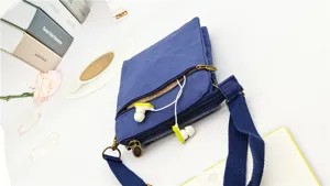 Blue canvas crossbody phone bag for women, multi-layer casual messenger shoulder bag.