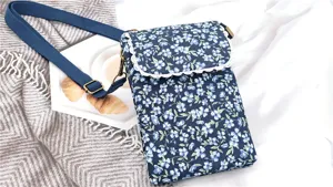 Floral fabric cross-body mobile phone bag with lace trim, small shoulder bag for women.