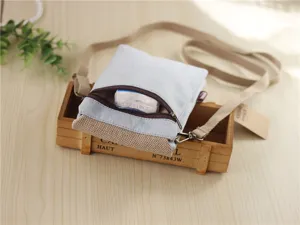 Casual denim cross-body phone bag with front zipper pocket and adjustable strap.