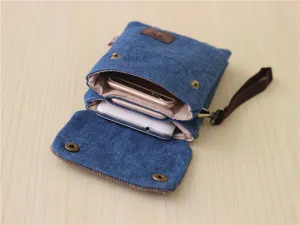 Denim mobile phone bag detail shot, showcasing multi-layer capacity and retro style.