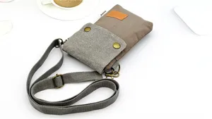 Solid color canvas crossbody phone bag, minimalist fabric multi-layer mobile pouch with strap.