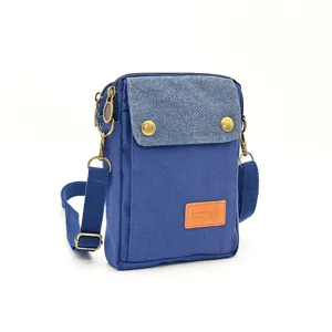 Casual canvas crossbody phone bag for women, multi-pocket design with adjustable strap.