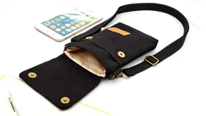 Solid black canvas crossbody phone bag with adjustable strap and multi-layer storage.