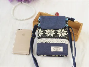 Canvas retro ethnic style crossbody phone bag with multi-layer design, detailed view.