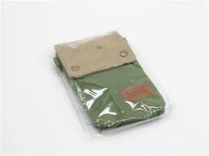 Solid color canvas crossbody phone bag with flap design and metal snap buttons for women.