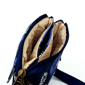 Floral quilted canvas crossbody phone bag with multi-zipper compartments for women daily use.