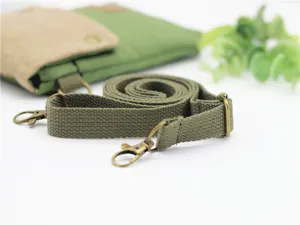 Canvas crossbody phone bag shoulder strap detail view, minimalist style, lightweight fabric design.