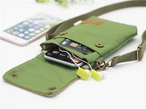 Canvas crossbody phone bag detail close-up showing multi-layer storage and adjustable strap.
