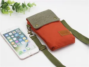 Detailed view of the casual canvas crossbody phone bag featuring multi-layer storage design.