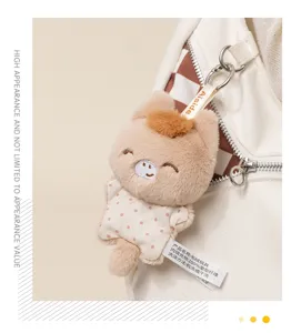 Cute plush animal toy bag pendant, soft stuffed doll detail, perfect accessory for backpacks.