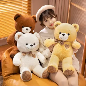 Cute teddy bear plush toy with heart bowtie, soft hugging doll for kids gifts and room decor details.