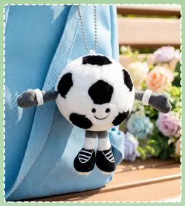 Cute plush soccer ball keychain doll, soft football pendant for backpack, cartoon sports toy.