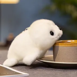 Cute simulation seal plush toy keychain fluffy white marine animal doll bag charm pendant.