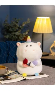 Cute unicorn plush toy holding red rose, soft stuffed animal doll for Valentine gift and decor.