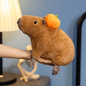 Cute capybara plush toy with pumpkin detail, soft stuffed animal doll for gifts.