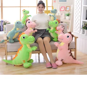 Cute dinosaur plush toy detail view showing soft stuffed animal doll pillow in cozy setting.