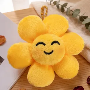 Ciondolo girasole in peluche giallo viso carino sorridente portachiavi decorazione