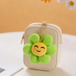 Delizioso ciondolo girasole in peluche con borsetta, perfetto accessorio per borsa e regalo.