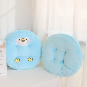 Cute blue round plush chair cushion with cartoon animal face and button tufted design.