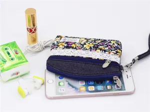 Floral fabric coin purse with double zipper and lace trim, portable hand strap mini wallet.