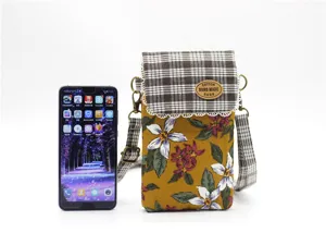 Floral canvas crossbody phone bag with plaid flap, multi-layer design, casual daily style.